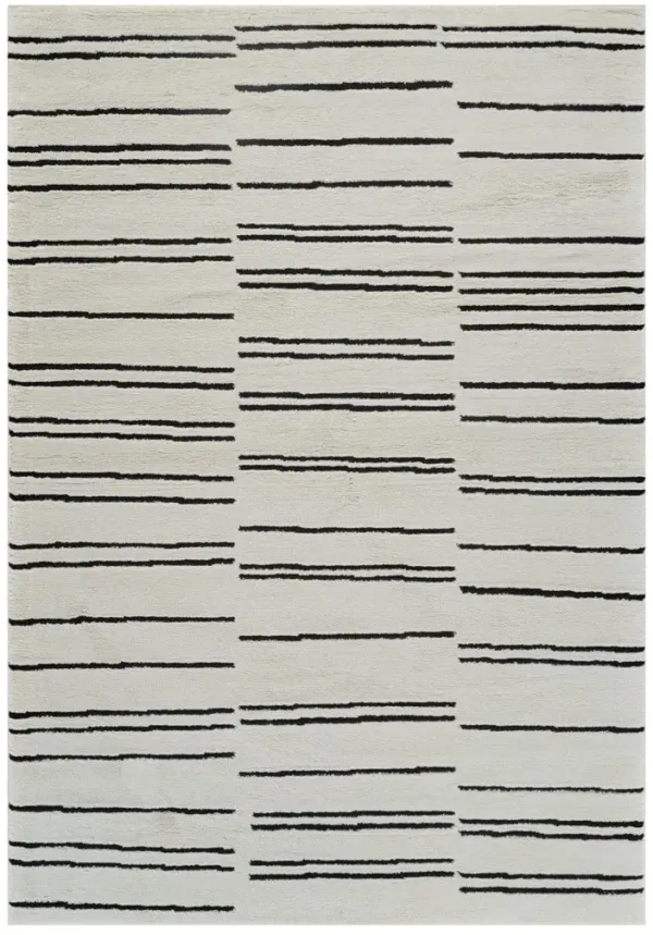 5.3' x 5.3' Abstract Worn Faded Area Rug - Cream And Black
