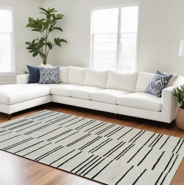 7' x 10' Abstract Distressed Area Rug - Cream And Black