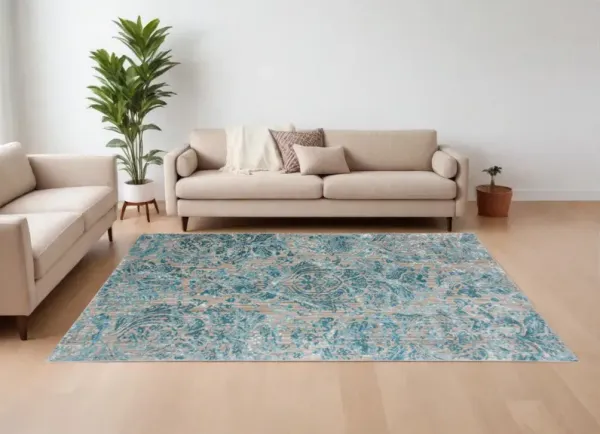 7.8' x 11' Abstract Power Loom Worn Faded Area Rug - Blue And Yellow