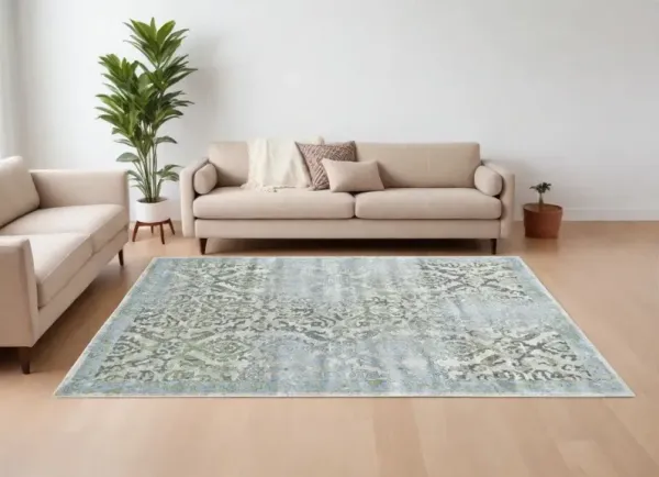 8' x 11' Floral Power Loom Worn Faded Area Rug - Blue Gray And Green