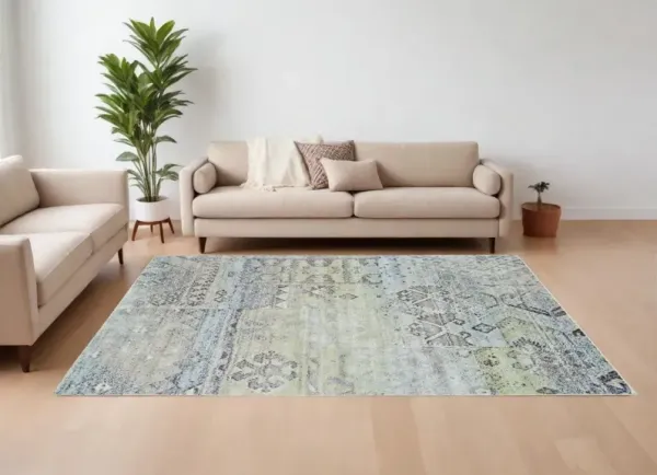 7' x 10' Abstract Power Loom Worn Faded Area Rug - Green And Gray