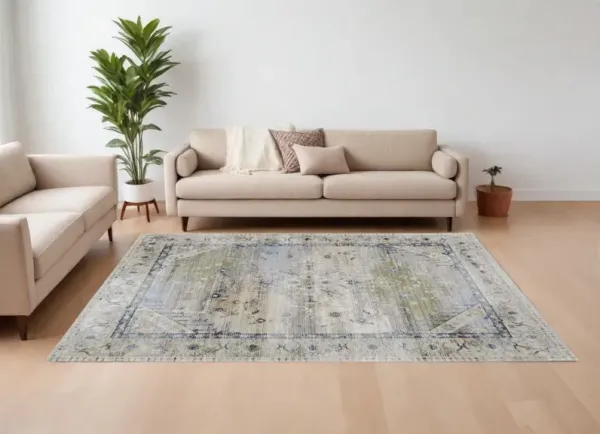 7' x 10' Abstract Power Loom Worn Faded Area Rug - Ivory Green And Blue