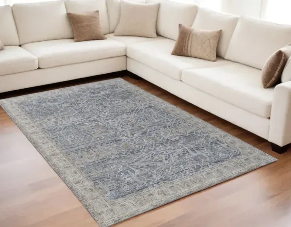 5' x 8' Ikat Power Loom Worn Faded Area Rug With Fringe - Taupe And Blue