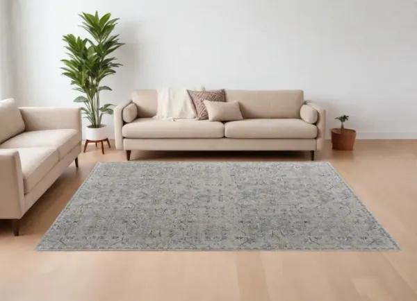 7' x 10' Abstract Power Loom Worn Faded Area Rug With Fringe - Ivory Tan And Blue