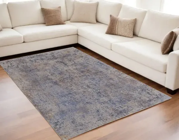 5' x 8' Abstract Power Loom Area Rug - Blue Brown And Tan