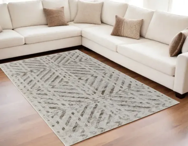 5' x 8' Geometric Power Loom Area Rug - Brown And Ivory