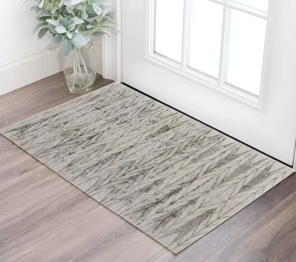 1.7' x 2.8' Geometric Power Loom Area Rug - Ivory And Brown