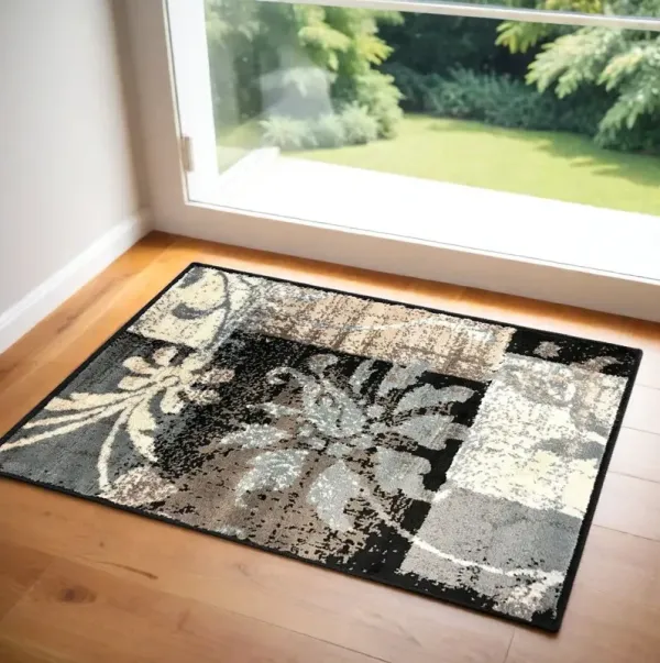 2' x 3' Floral Power Loom Distressed Stain Resistant Area Rug - Beige And Gray