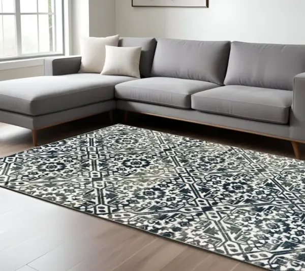 6' x 9' Geometric Power Loom Stain Resistant Area Rug - Navy And Ivory