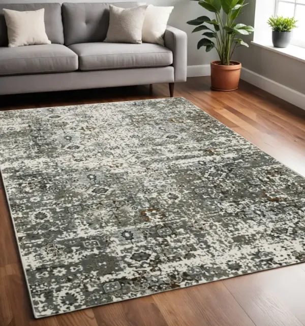 5' x 8' Oriental Power Loom Stain Resistant Area Rug - Ivory Gray Charcoal Rust Gold And Brown