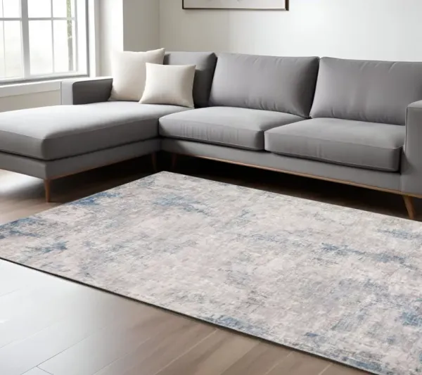 8' x 10' Abstract Power Loom Stain Resistant Area Rug - Gray And Blue