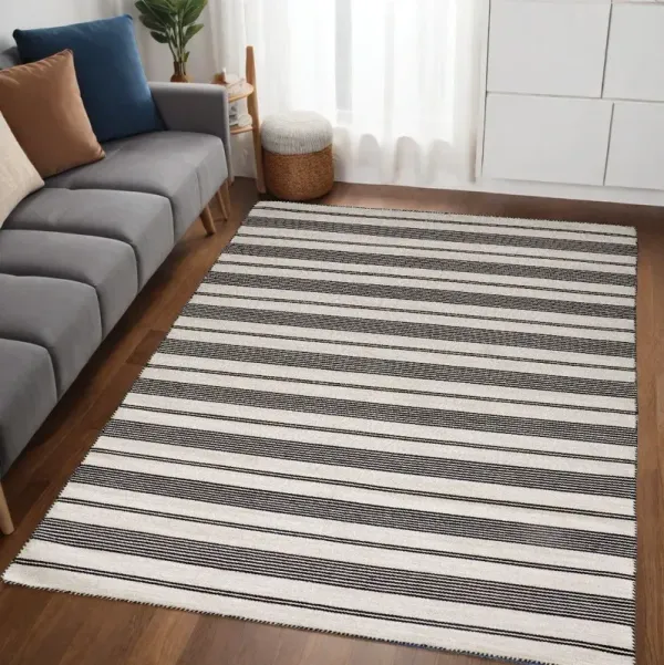 5' x 8' Striped Dhurrie Hand Woven Stain Resistant Area Rug - Black And White