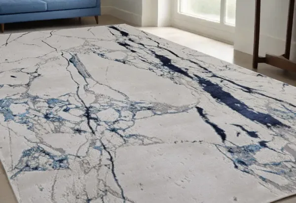 5' x 8' Marble Power Loom Distressed Area Rug - Ivory And Blue