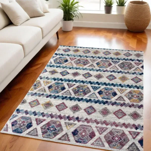 5' x 8' Geometric Power Loom Area Rug - Ivory Blue And Orange