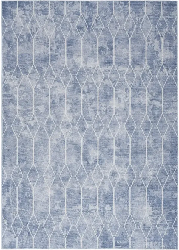 6' x 9' Geometric Power Loom Washable Area Rug - Blue And Off White