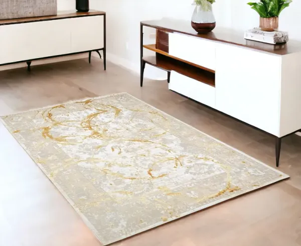 4' x 5.9' Abstract Area Rug - Beige And Gold