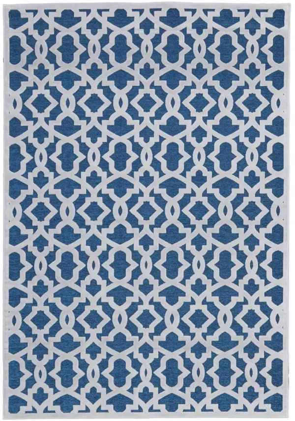 5.3' x 7.5' Geometric Power Loom Area Rug - Blue And White