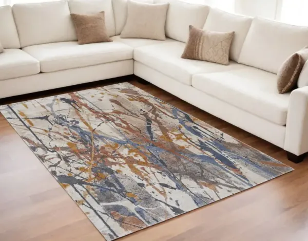 5.3' x 8' Abstract Power Loom Area Rug - Ivory Blue And Brown