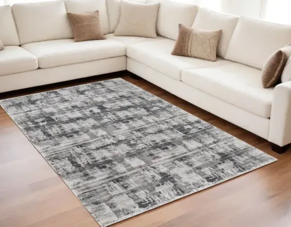 5' x 7.5' Abstract Power Loom Area Rug - Gray And Ivory