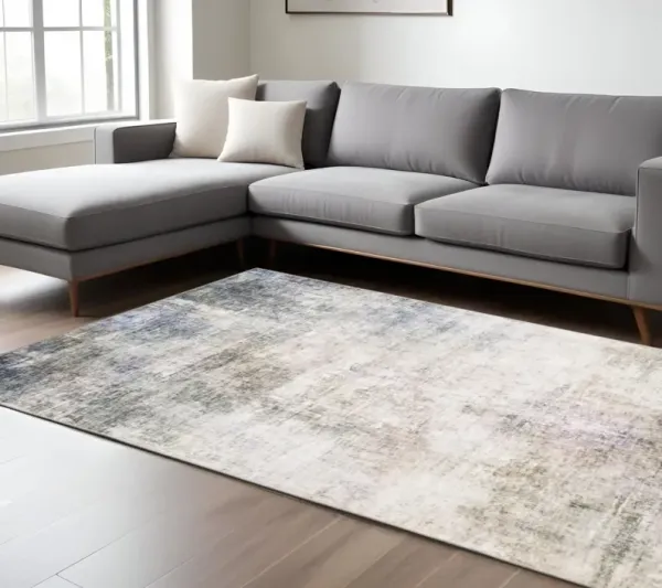 8' x 10' Abstract Power Loom Stain Resistant Area Rug - Beige Blue Gray Green Brown And Purple