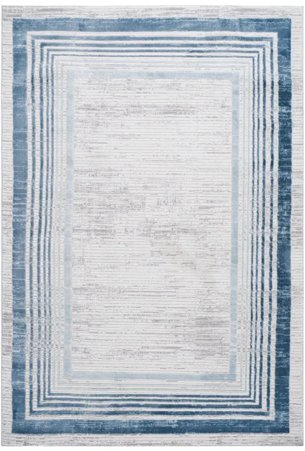 Marfi - 5' X 7' Bordered Area Rug - Blue / Ivory