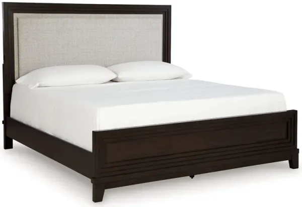 Neymorton - Queen Upholstered Panel Bed - Dark Grayish Brown
