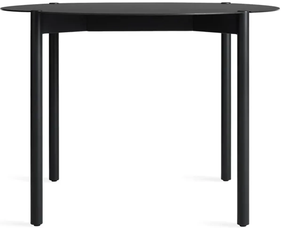 Comeuppance Round Dining Table