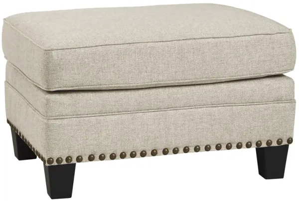 Benchcraft® Claredon Linen Ottoman