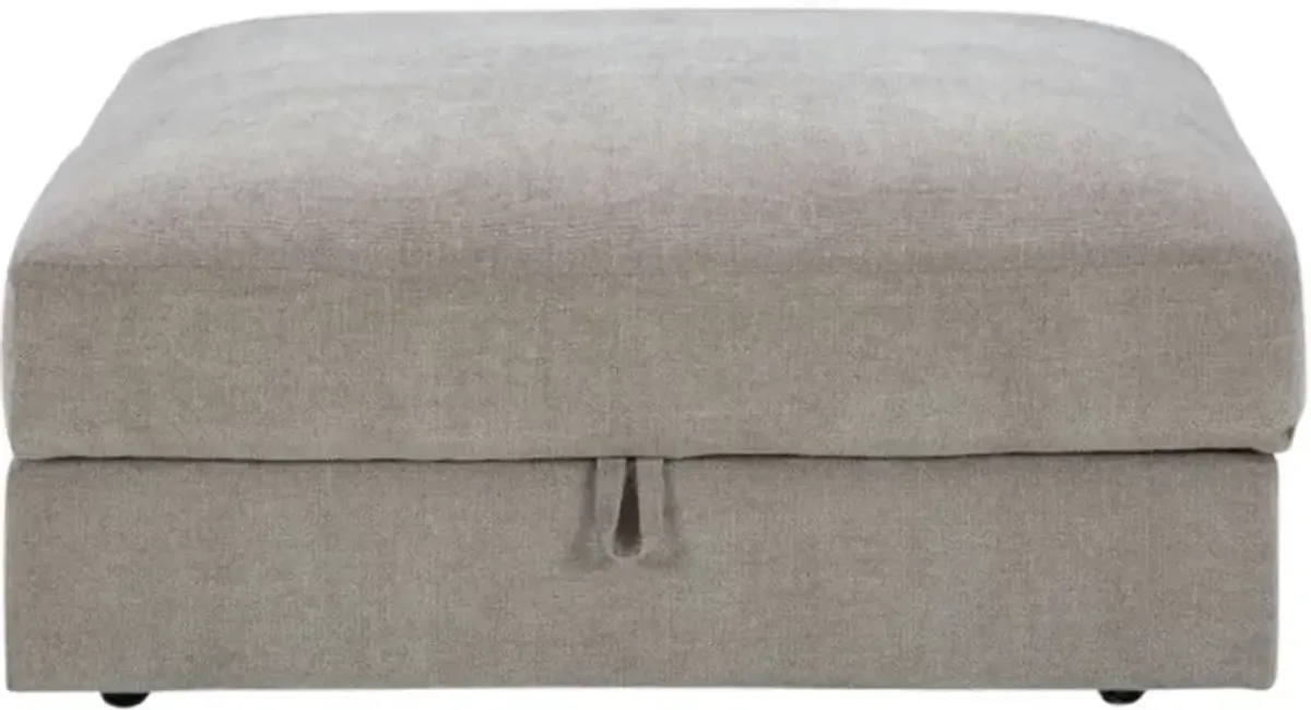 Benchcraft® Aslan Court Flax Ottoman with Storage