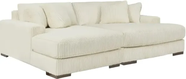 Signature Design by Ashley® Lindyn 2-Piece Ivory Small Spaced Sectional and Super Chaise