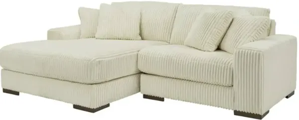 Signature Design by Ashley® Lindyn 2-Piece Ivory Left Arm Facing Sectional and Chaise