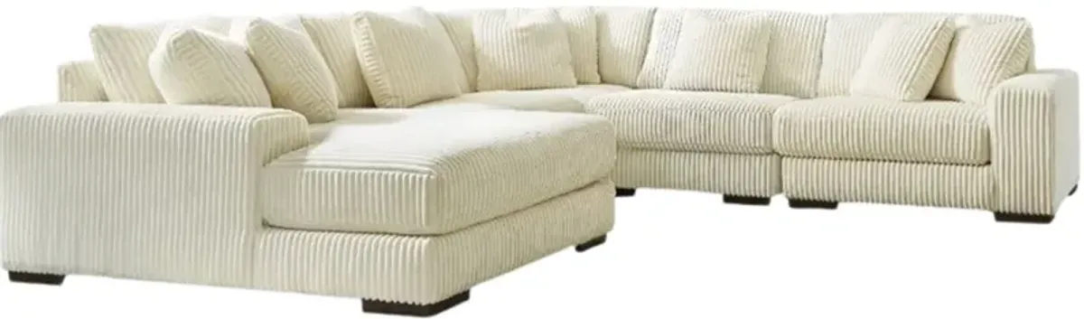 Signature Design by Ashley® Lindyn 5-Piece Ivory Left Arm Facing Sectional and Chaise