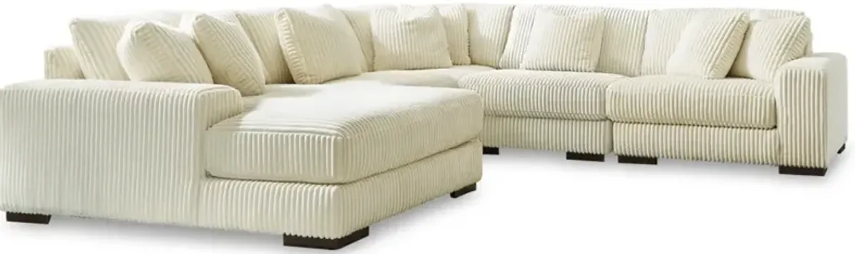 Signature Design by Ashley® Lindyn 5-Piece Ivory Left-Arm Facing Sectional and Chaise