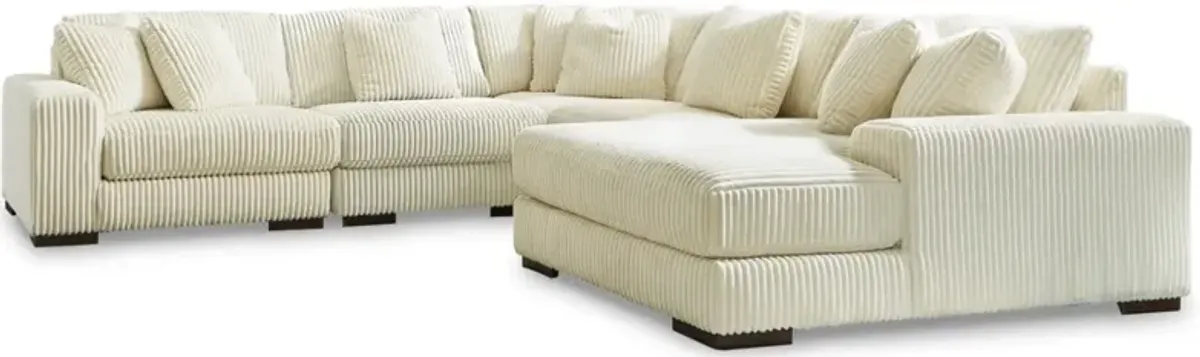 Signature Design by Ashley® Lindyn 5-Piece Ivory Right-Arm Facing Sectional and Chaise