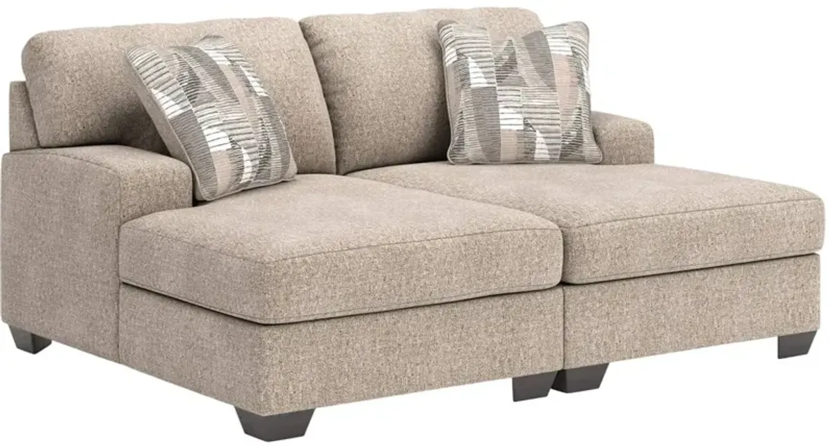 Benchcraft® Newellen 2-Piece Hemp Super Chaise Sectional