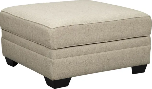Ashley® Luxora Bisque Ottoman With Storage