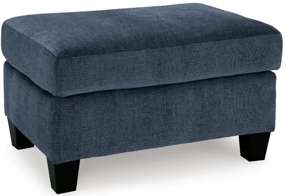 Benchcraft® Amity Bay Ink Ottoman