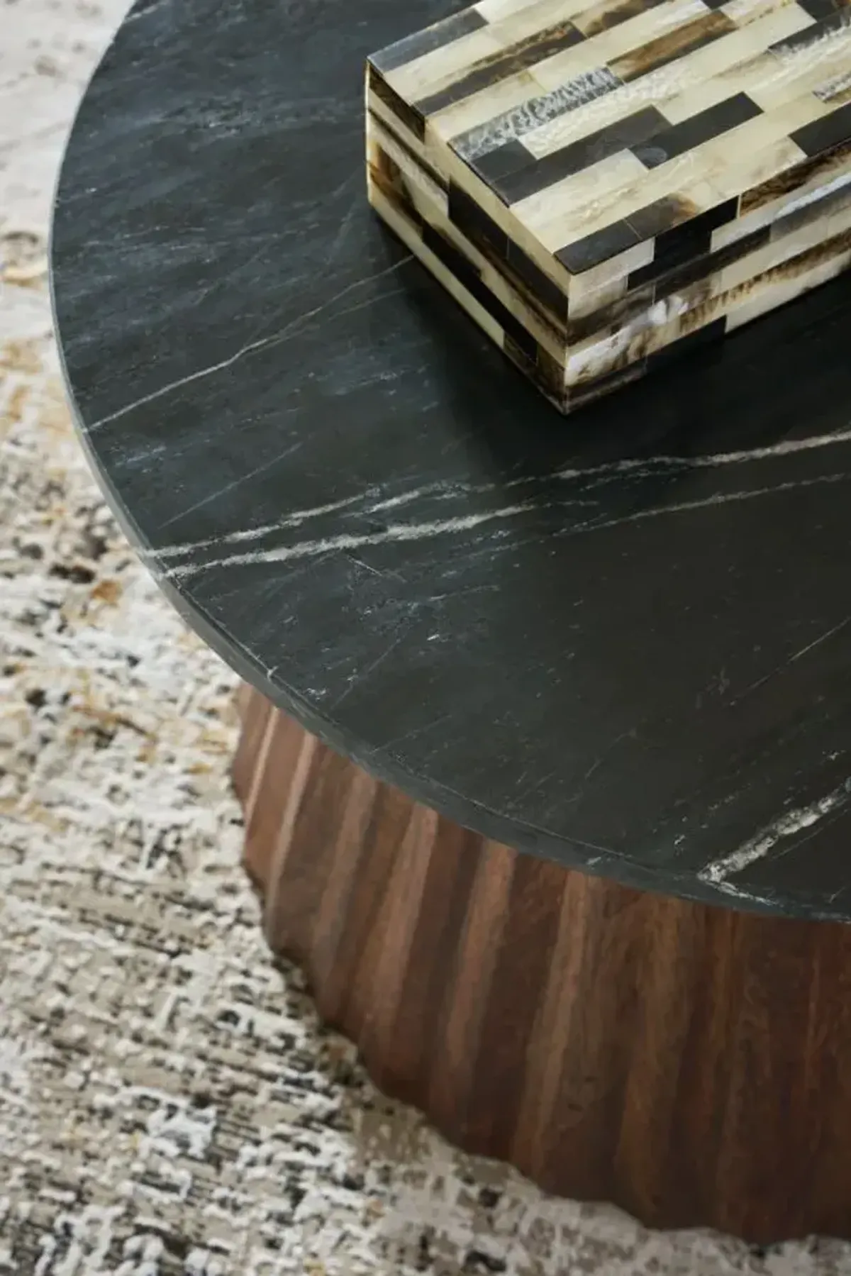 Signature Design by Ashley® Ceilby Black Coffee Table with Warm Brown Base