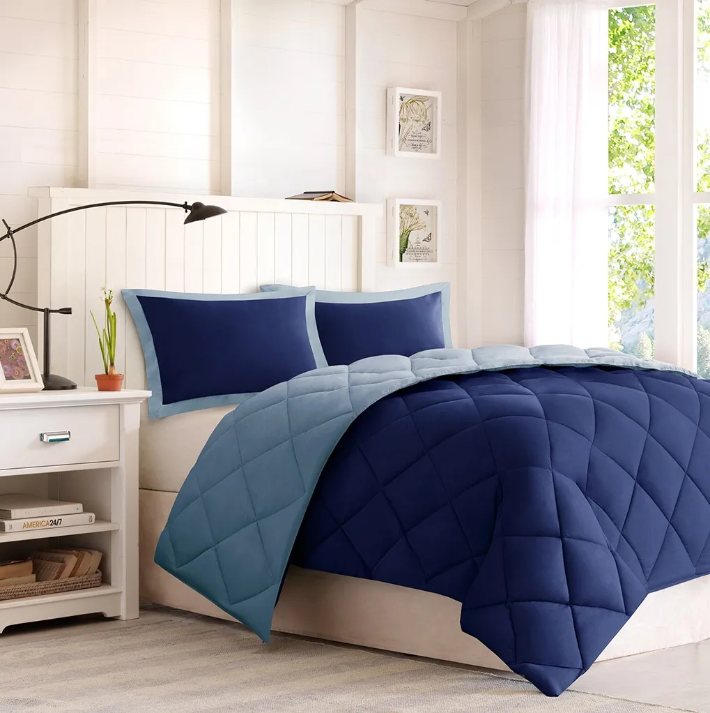 Olliix by Madison Park Essentials Larkspur Light Blue/Navy Twin/Twin XL 3M Scotchgard Reversible Down Alternative Comforter Set