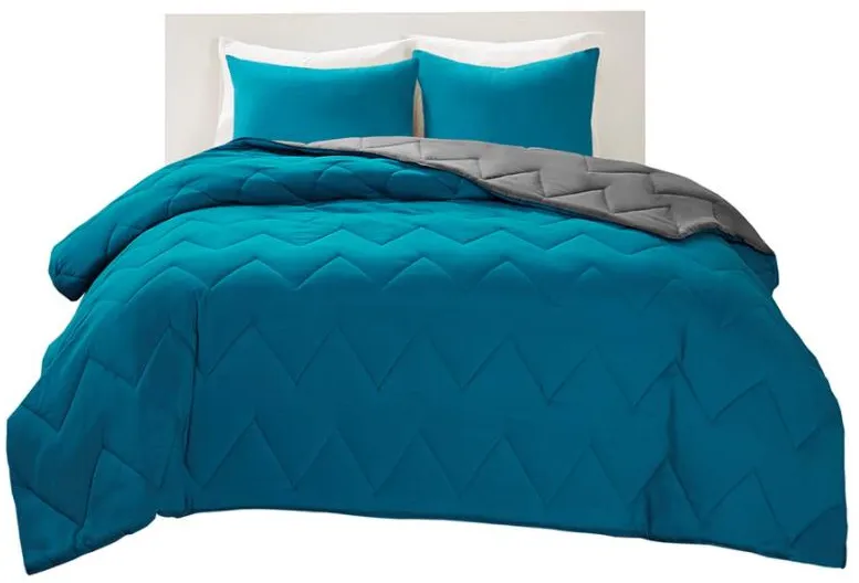 Olliix by Intelligent Design Trixie Teal Twin/Twin XL Reversible Comforter Mini Set