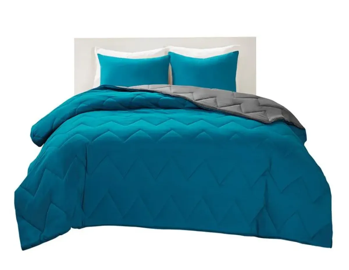 Olliix by Intelligent Design Trixie Teal Full/Queen Reversible Comforter Mini Set