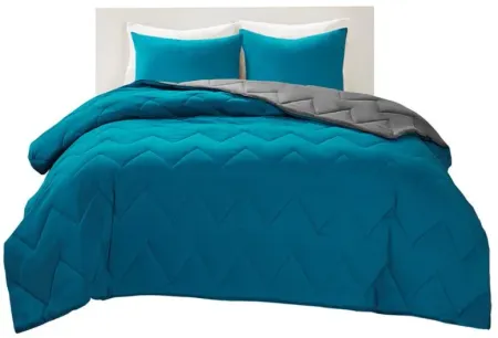 Olliix by Intelligent Design Trixie Teal Full/Queen Reversible Comforter Mini Set