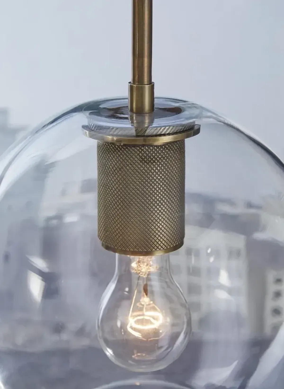 Signature Design by Ashley® Cordunn Antique Brass/Clear Pendant Light