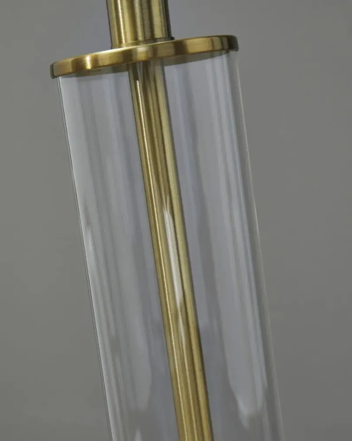 Signature Design by Ashley® Orenman 2-Piece Clear/Brass Table Lamp