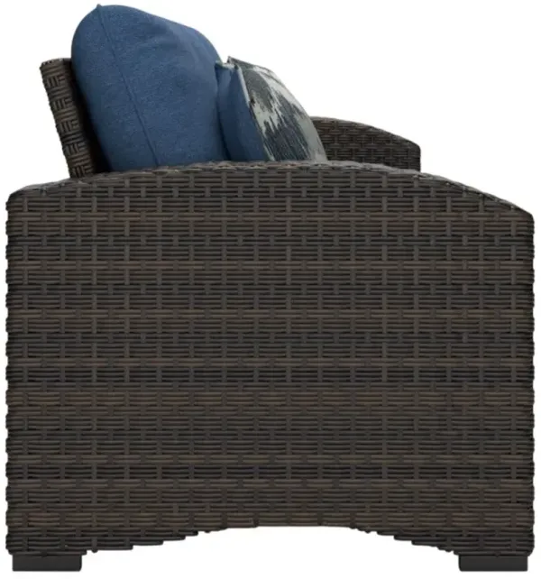 Signature Design by Ashley® Windglow Blue/Brown Nuvella/Wicker Outdoor Sofa