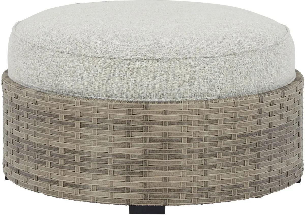 Signature Design by Ashley® Calworth Beige Outdoor Ottoman