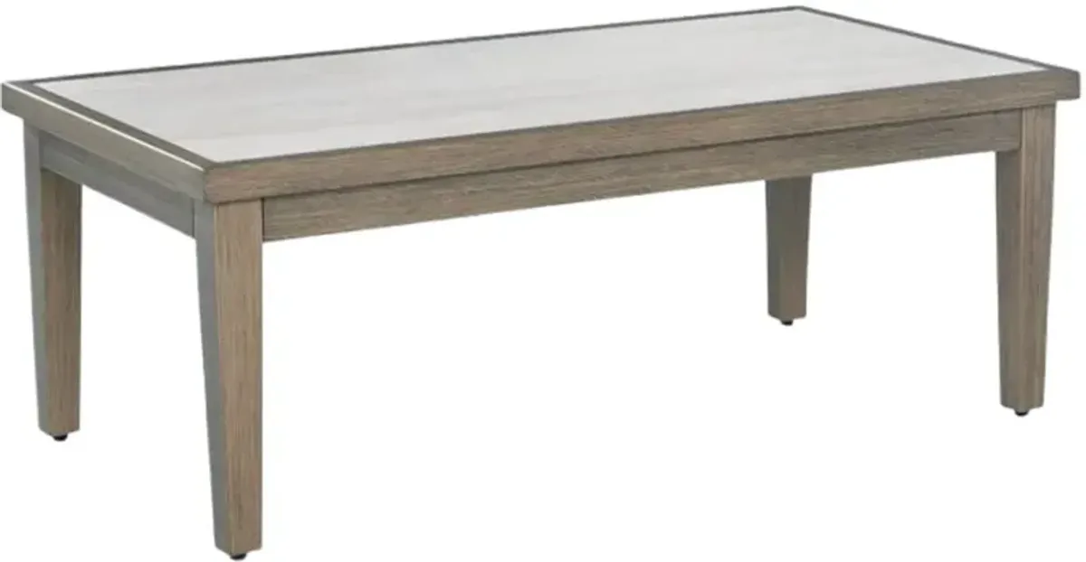 Signature Design by Ashley® Rainier Ranch Beige Aluminum/Stone Outdoor Coffee Table with Brown Base