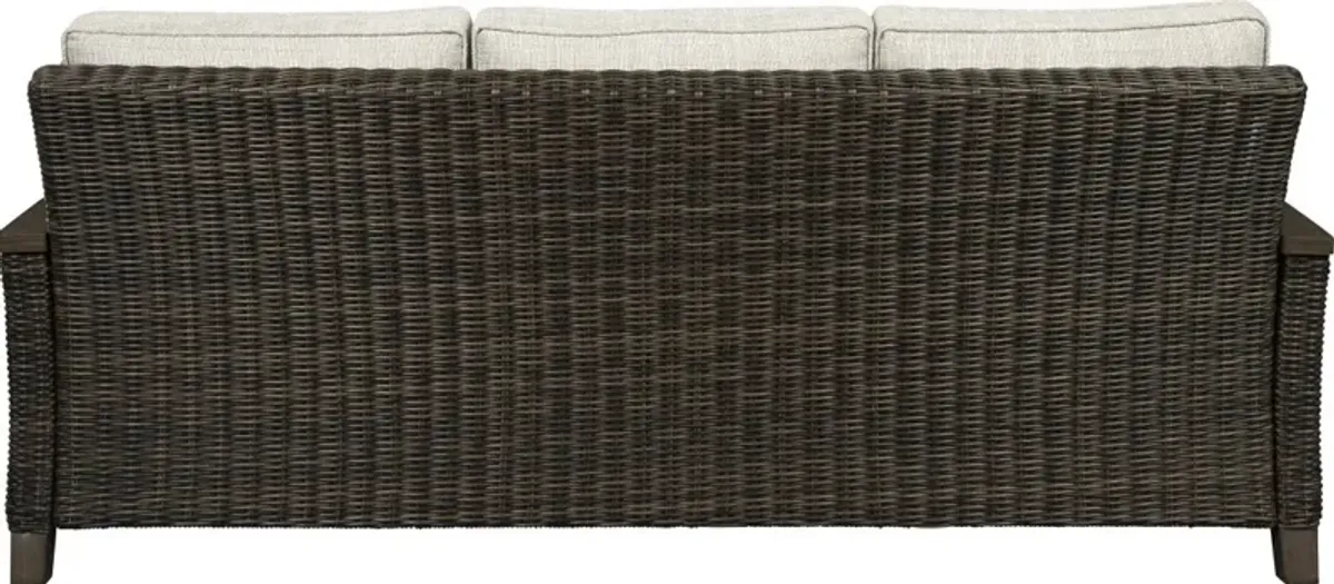 Signature Design by Ashley® Paradise Trail Medium Brown Aluminum/Resin Wicker Outdoor Sofa with Cushion