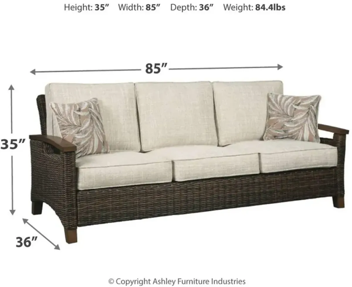 Signature Design by Ashley® Paradise Trail Medium Brown Aluminum/Resin Wicker Outdoor Sofa with Cushion