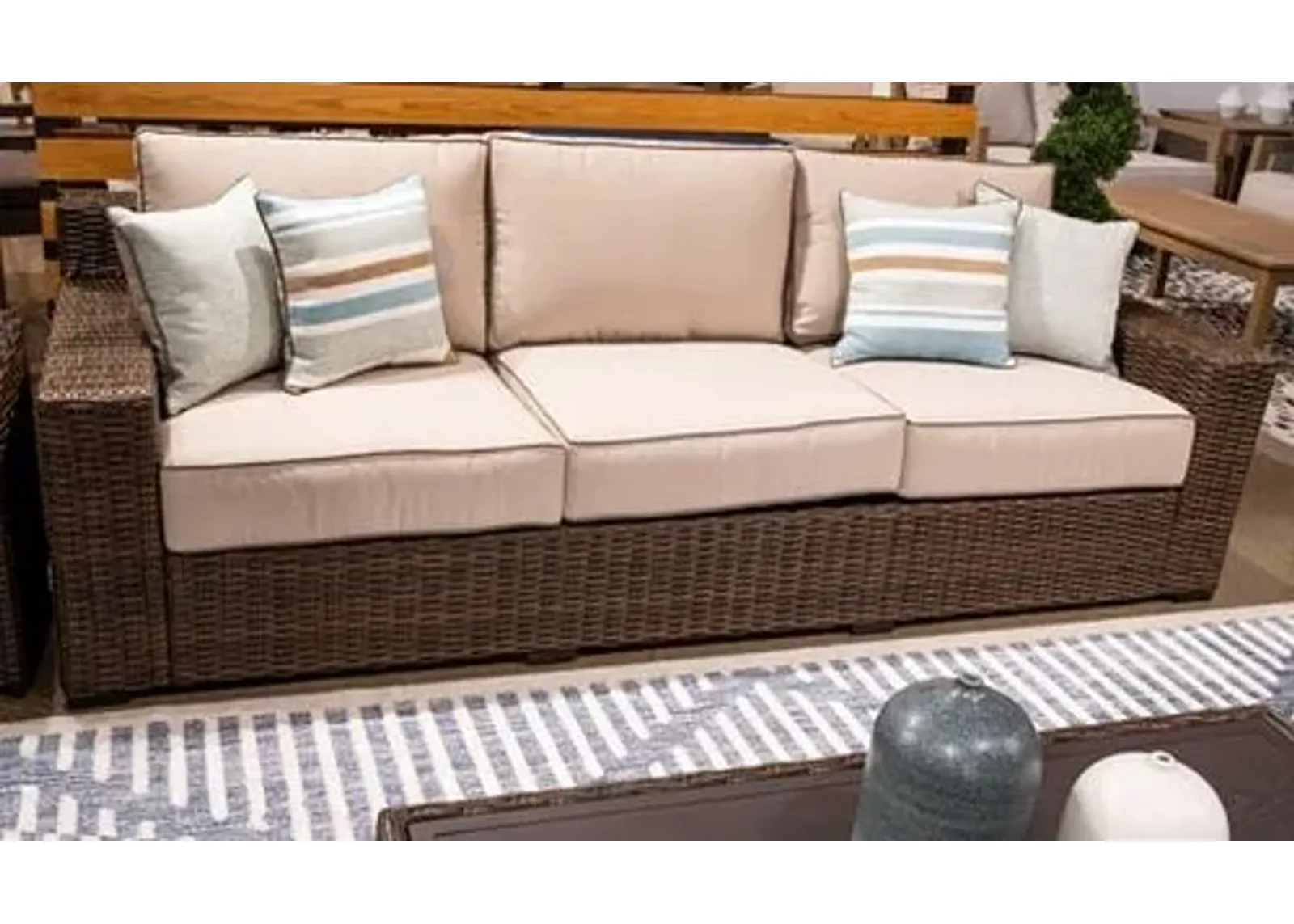 Signature Design by Ashley® Coastline Bay Brown Outdoor Sofa with Chaise